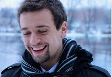 Zachary J. Moore, a choir director at Waukesha West High School