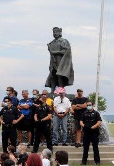 A photo of a 2020 Protest over the Christopher Columbus statue in Downtown Kenosha