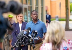 Democratic gubernatorial nominee David Crowley, center, and lieutenant governor nominee Sarah Godlewski, left, speak to the media Wednesday, Aug. 12, 2026, in Middleton, Wis. Kayla Wolf/AP Photo