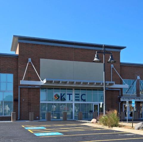 Photo of the exterior of the former grocery store building. 