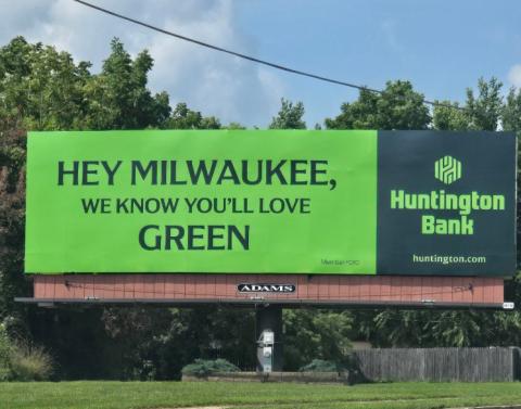 Photo of a billboard in Kenosha for a bank that starts out with "Hey Milwaukee" 