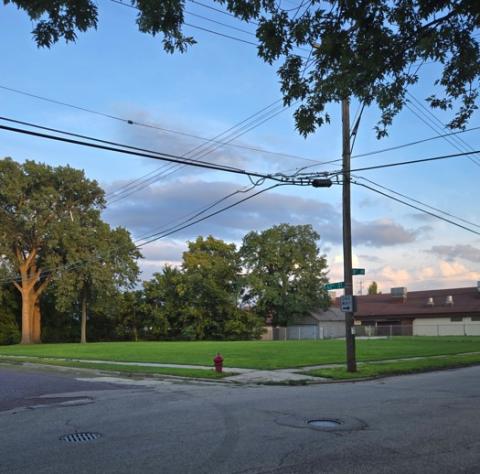 Photo of an empty lot where Deming School once stood. 