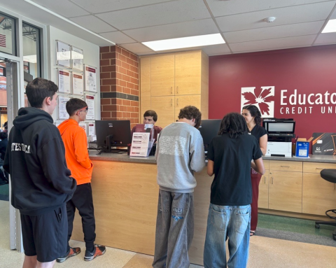 Students line up to be served at Educators' Burlington High School branch. 