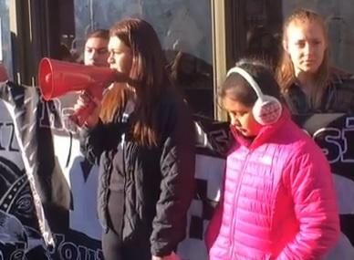 Valeria Ruiz, 20,  Speaking with her 9 year old sister during immigration rally at Speaker Paul Ryan's Office in Racine
