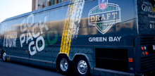 Image of Packers tour bus. 