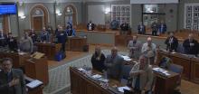 Kenosha County Supervisors recite the pledge of allegiance at a recent meeting. 