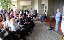 Kenosha County Executive Samantha Kerkman speaks before a small crowd in the county Administration Building. 