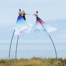 Three dancers on 'sway' poles. 