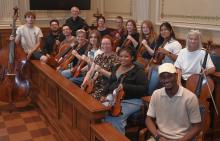 Photos of members of the orchestra that'll play at the courtroom rededication. 